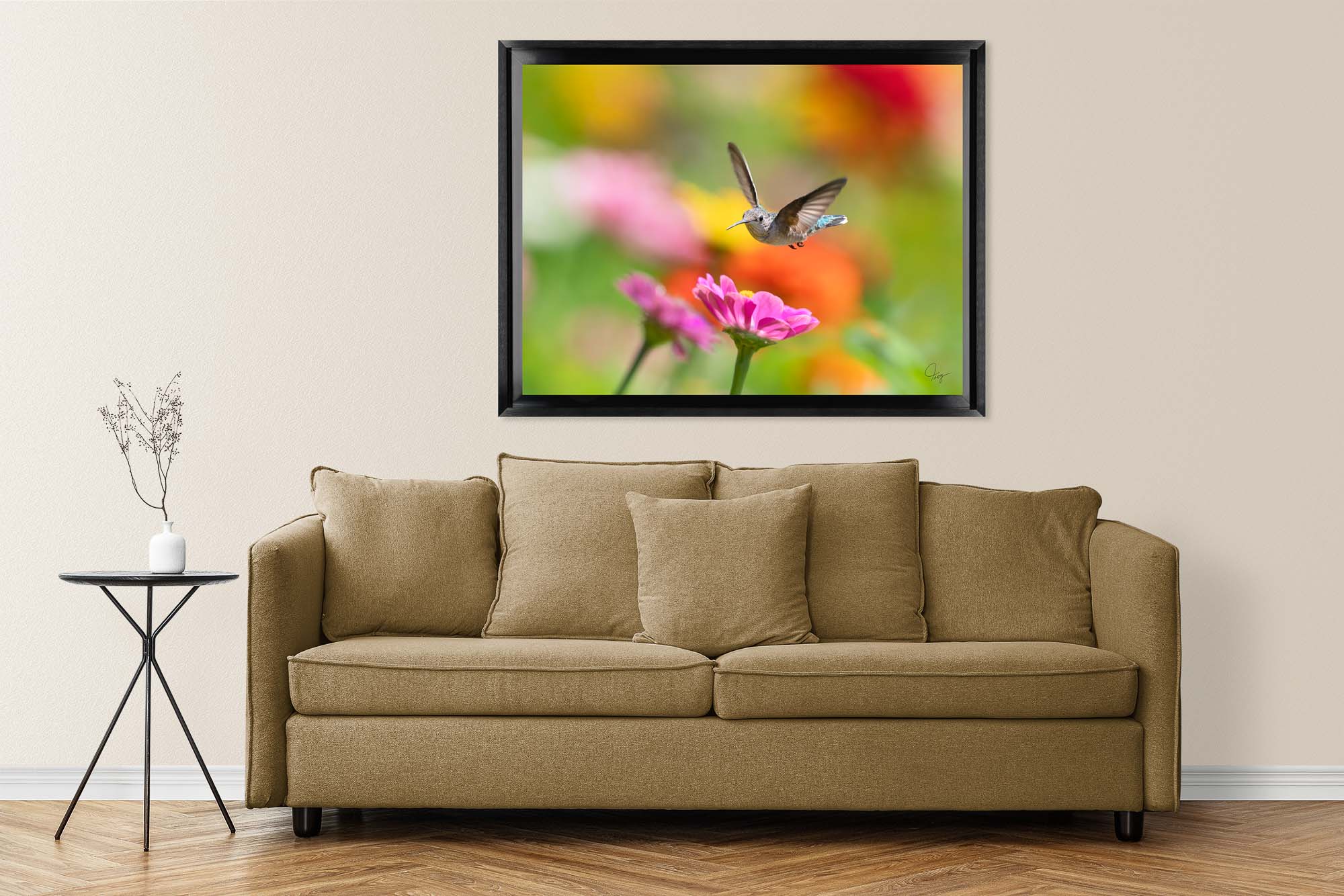 Ruby-throated Hummingbird hovering in the flowers