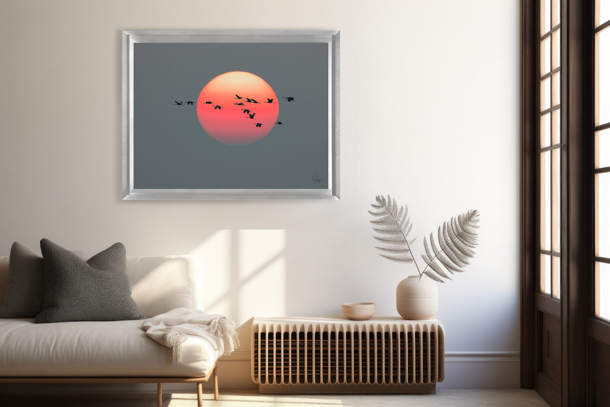 Sandhill Cranes against a smoky sunset